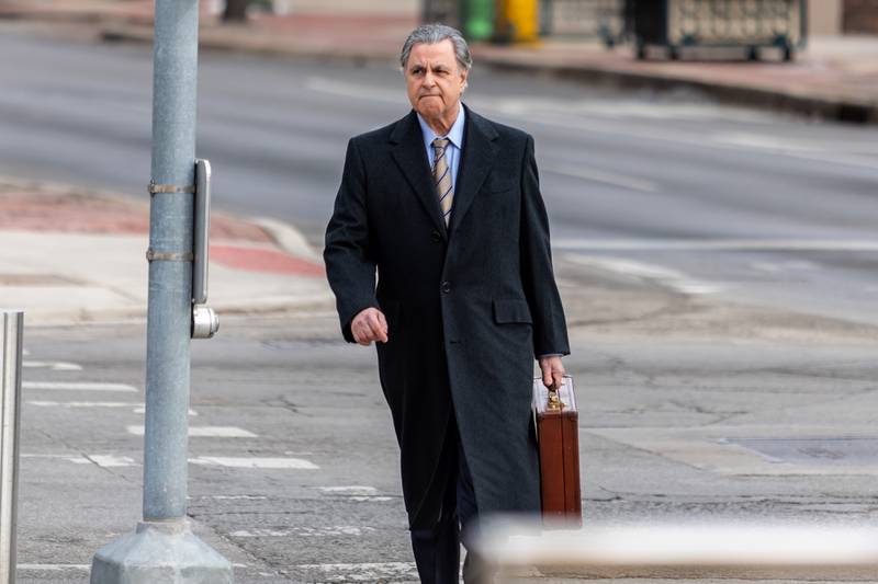 Defense attorney George Lenard arrives at the Will County Courthouse in Joliet on Feb. 24. for the first day of the trial against Joseph Czuba.