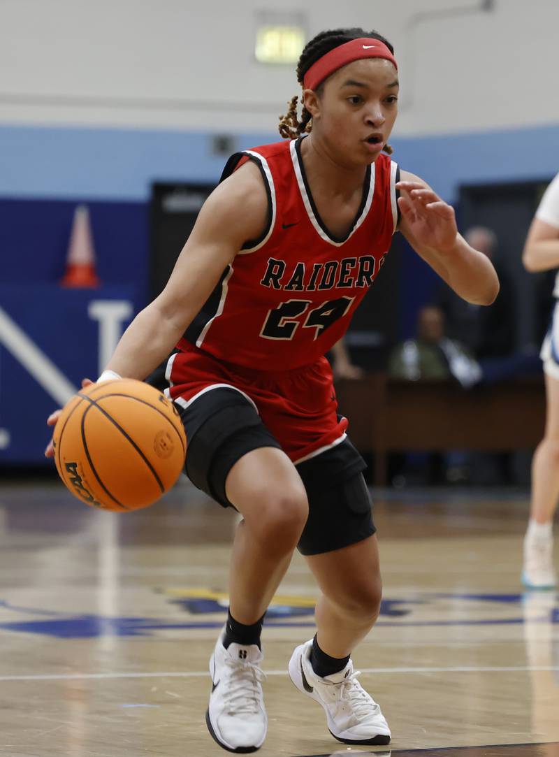 Bolingbrook's A'mya Simmons (24) handles the ball during the girls varsity basketball game between Bolingbrook high school and Nazareth Academy on Monday, Jan. 12, 2026 in La Grange Park.
