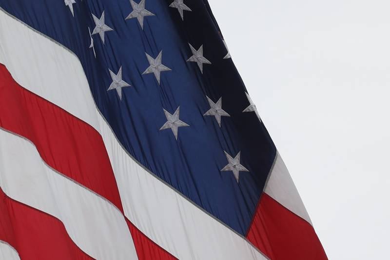 The American flag flies over the Vietnam Moving Wall on Saturday, July 1st, 2023, in Manhattan.