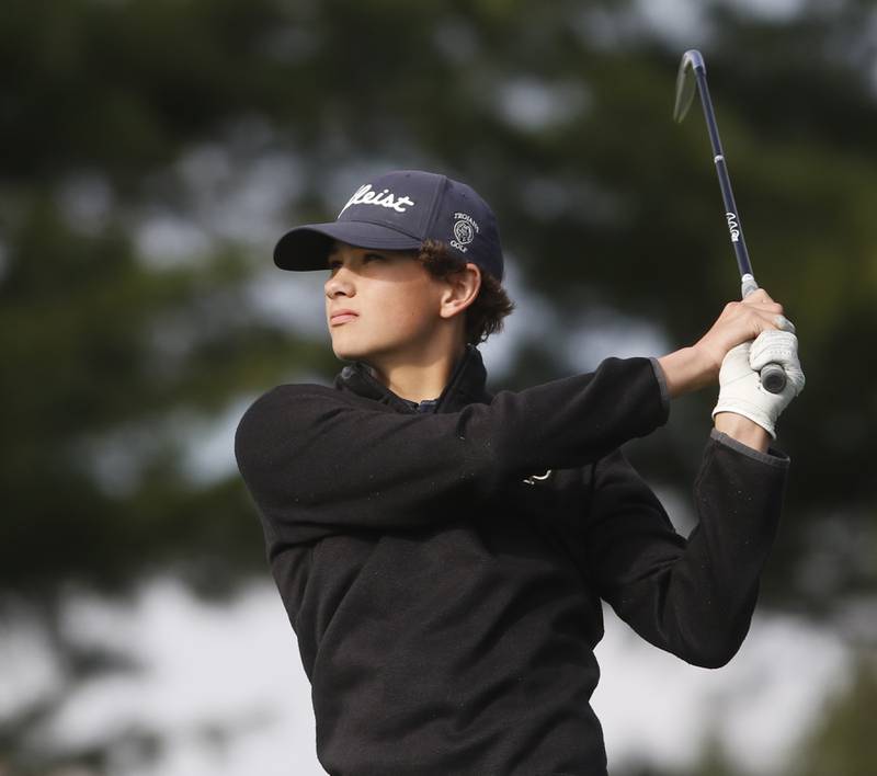 Cary-Grove’s Connor Lentz watches his tee shot on the eighth hole during the IHSA Class 3A Jacobs Sectional golf tournament on Monday, Oct. 7, 2024, at Randall Oaks Golf Club in West Dundee.
