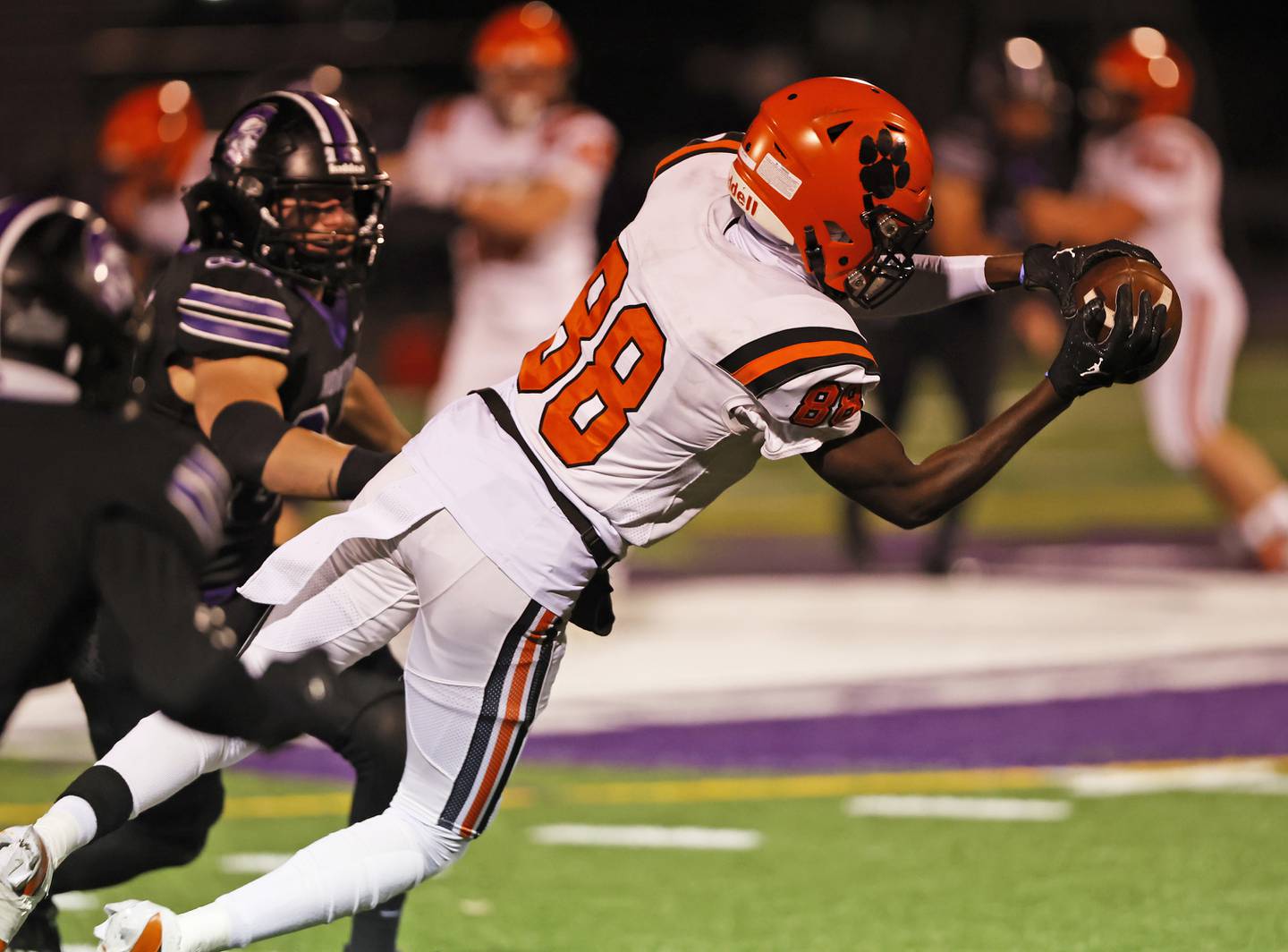 Wheaton Warrenville South's Amari Williams (88) lays out for a catch during the 7A first-round playoff game between Wheaton Warrenville South and Downers Grove North high schools on Friday, Nov. 1, 2024 in Downers Grove.