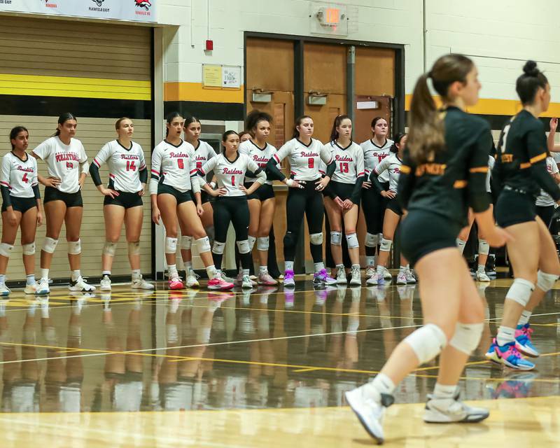 Bolingbrook watches Joliet West warm up before their regional final volleyball match.  Oct 26, 2023.