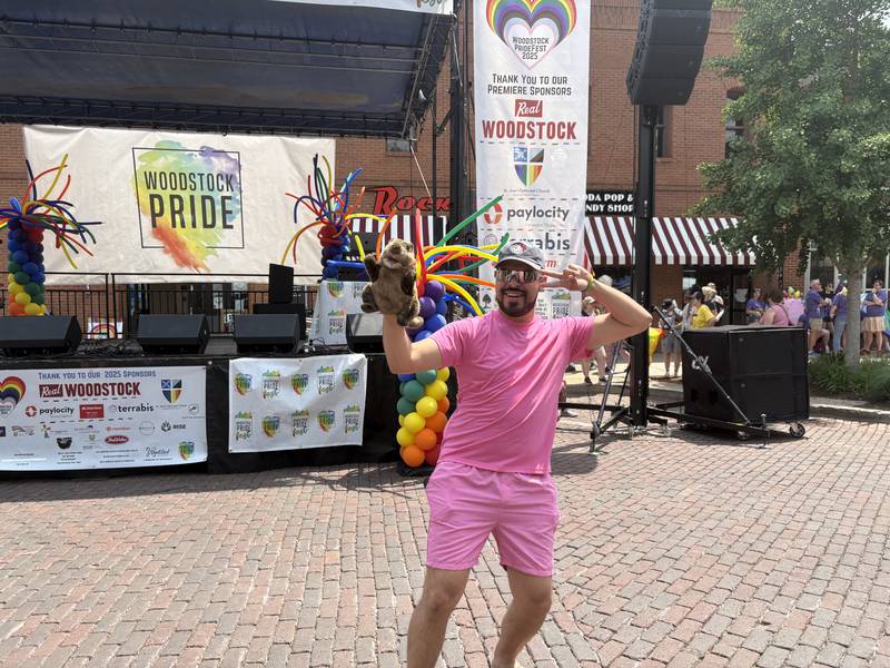 Joel Ballestros dances with a Woodstock Willie puppet during Woodstock PrideFest June 15, 2025.