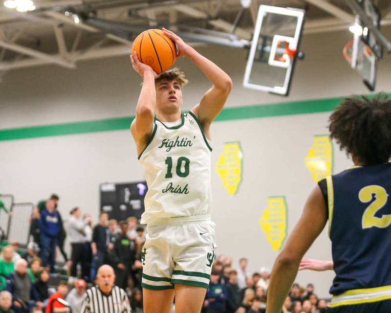 Bishop Mcnamara's Coen Demack (10) puts up a shot during their Class 2A Seneca Sectional final basketball game between Bishop McNamara at Yorkville Christian, March 6, 2026 in Senaca.