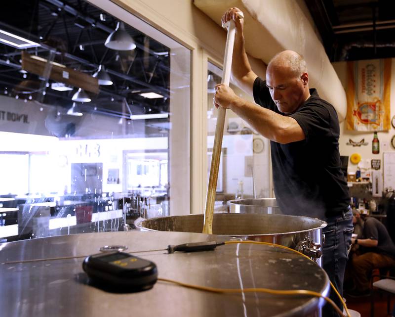 Brewmaster Ryan Clooney brews a batch of Hefe Weizen beer on Friday, May 3, 2024 at the Crystal Lake Brewing. The brewery is celebrating its 10th anniversary and recently won a bronze award in Brown Porter category at the World Beer Cup in Las Vegas.
