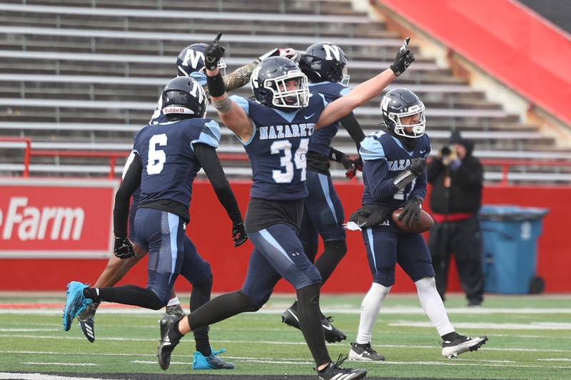 Nazareth celebrates the onside kick recovery to seal the win over Joliet Catholic in the Class 5A state championship on Saturday, Nov. 30, 2024 in Normal.