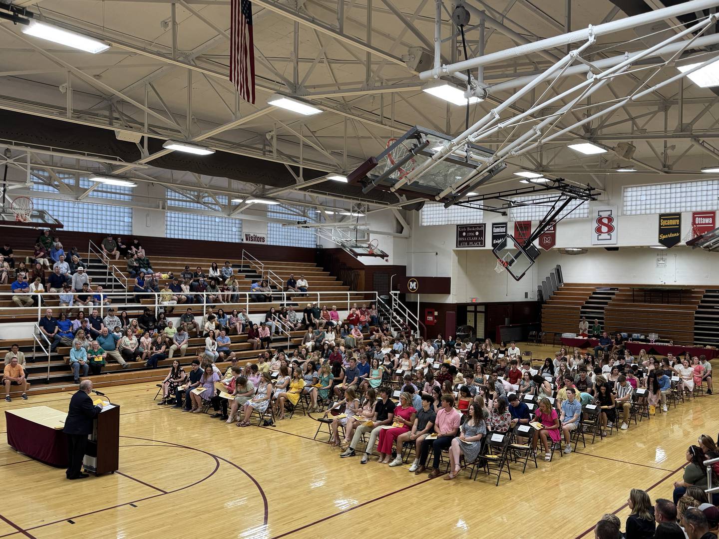 The students being honored at Morris Community High School's honors night on Wednesday, May 7, 2025 listen to Superintendent Craig Ortiz.