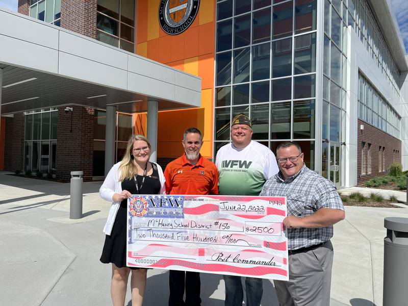 Veterans of Foreign Wars Post 4600 delivered a $2,500 donation to McHenry High School District 156 on June 22, 2022. Pictured left to right: Assistant Superintendent for Finance and Personnel  Julia Pontarelli, McHenry High School Principal Jeff Prickett, VFW Post 4600 Senior Vice Cmdr. John Hrynkow and Assistant Superintendent for Learning and Innovation Carl Vallianatos.