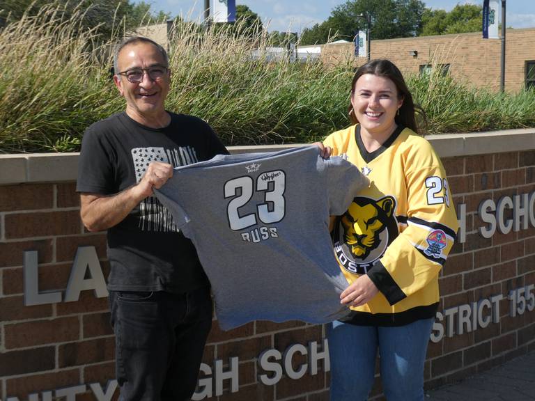 Mayor Haig Haleblian, left, meets with professional hockey player Katelynn Russ,  left, who grew up in Crystal Lake, and proudly displayed the Isobel Cup at Crystal Lake South High School Wednesday afternoon, Aug. 24, 2022, after being part of the championship-winning Boston Pride squad this past season.
