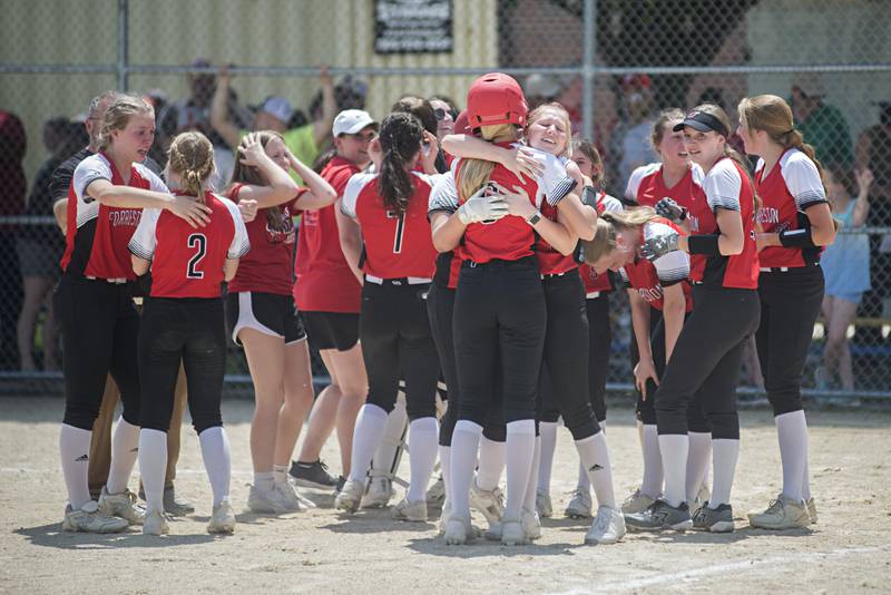 The Forreston softball team celebrate after beating West Central 6-5 Monday, May 30, 2022.