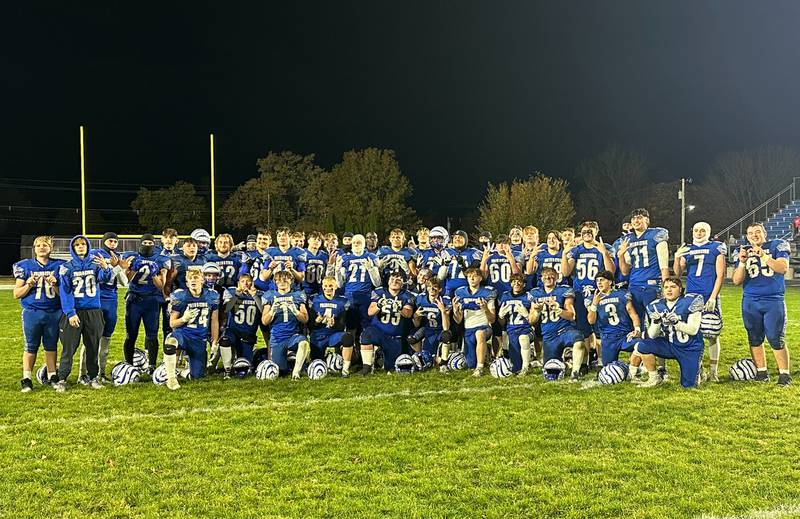 Members of the Princeton football team pose after defeating Oregon in the Class 3A playoff game on Friday, Nov. 1, 2024 at Princeton High School.