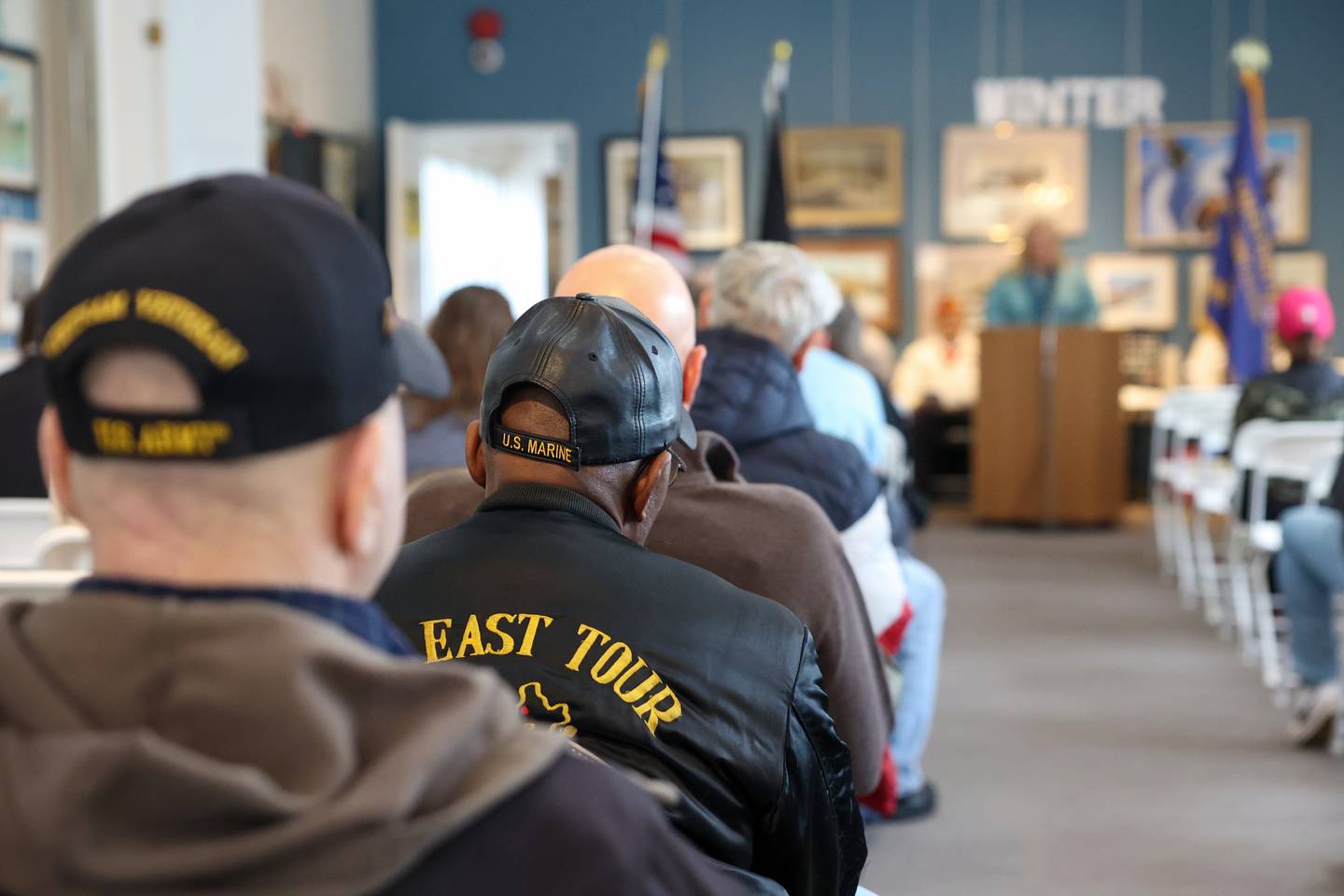 Veterans listen to the reading of "A Soldier Known But To God" during the Kankakee County Veterans Council's Veterans Day Ceremony on Nov. 11, 2025, at the Kankakee County Museum.