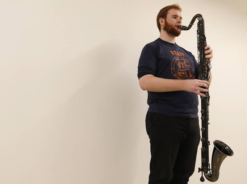 David Sommer, 18, of Huntley, with the bass clarinet that was purchased for the McHenry County College Music Department out of memorial funds provided in 2016 by Grace C. Hajeck, a lifelong musician and educator