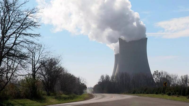 Pictured is the Byron Nuclear Generating Station in Byron Illinois, Ogle County. The reactor buildings were constructed by Commonwealth Edison and house two Westinghouse Four-Loop pressurized water reactors, Unit 1 and Unit 2, which began operation in September 1985 and August 1987 respectively. The plant provides electricity to northern Illinois and the city of Chicago. In 2005, it generated on average about 2,450 MWe, enough power to supply about 2 million average American homes. The station employs over 600 people, mostly from Ogle and Winnebago counties, and features two prominent 495-foot (151 m) cooling towers.