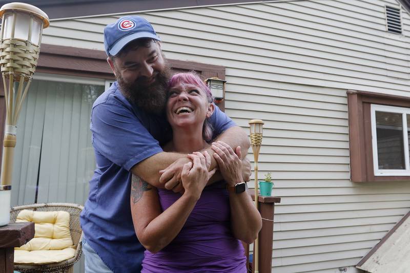Alice Wilson and boyfriend Randy Ingram pose for a portrait together at home on Wednesday, Aug. 25, 2021 in Crystal Lake. They moved in March from an apartment on W. Jackson St. in Woodstock which they say had multiple serious issues.