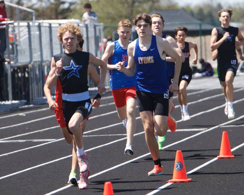 St. Charles North's Matthew Russel and Lyons Parker Robinson run in the 800 Meters at Kaneland's Peterson Prep invite on Saturday, April 26,2025 in Maple Park.
