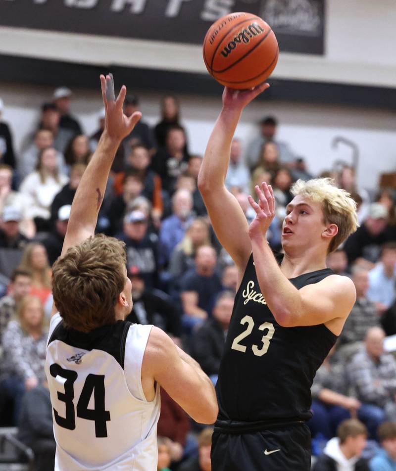 Sycamore's Carter York shoots over Kaneland's Parker Violett during their game Friday, Jan. 5, 2024, at Kaneland High School in Maple Park.