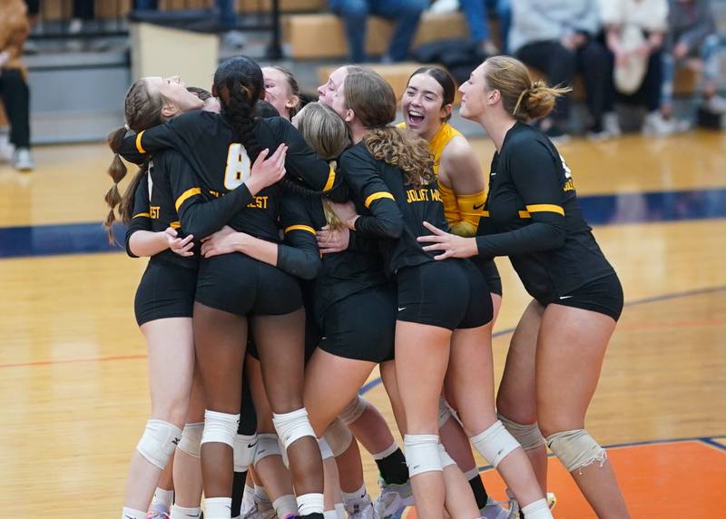 Joliet West's celebrates their victory over Lincoln-Way West  in their class 4A Oswego Sectional semifinal match at Oswego High School on Monday, Oct. 30, 2023.