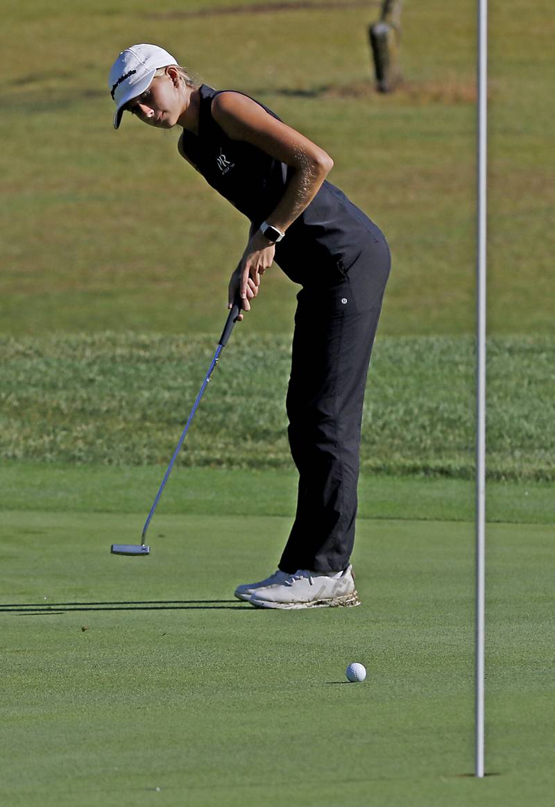 Prairie Ridge’s Jenna Albanese putts on the 4th green during the Fox Valley Conference Girls Golf Tournament Wednesday, Sept. 25, 2024, at Crystal Woods Golf Club in Woodstock.