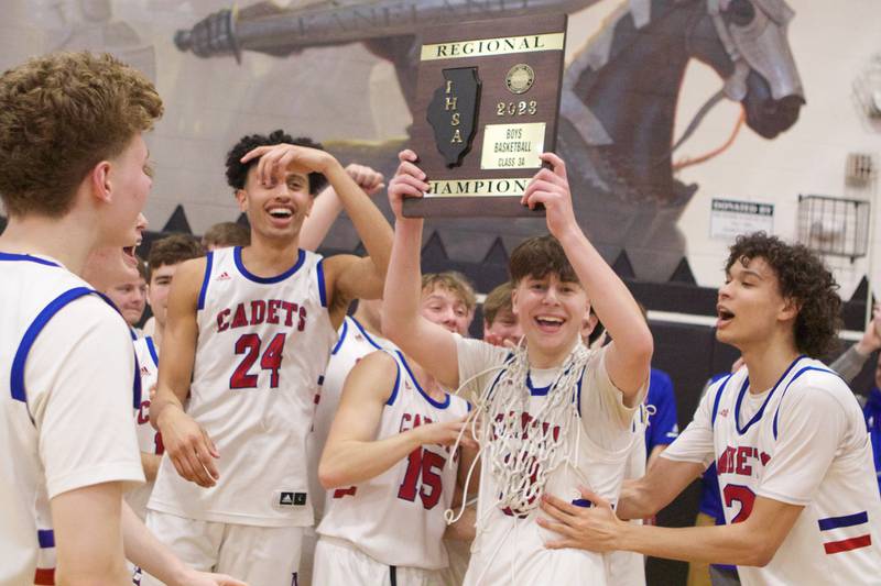 Marmion Academy celebrates winning the Class 3A Regional Final at Kaneland on Saturday, Feb.25, 2023.
