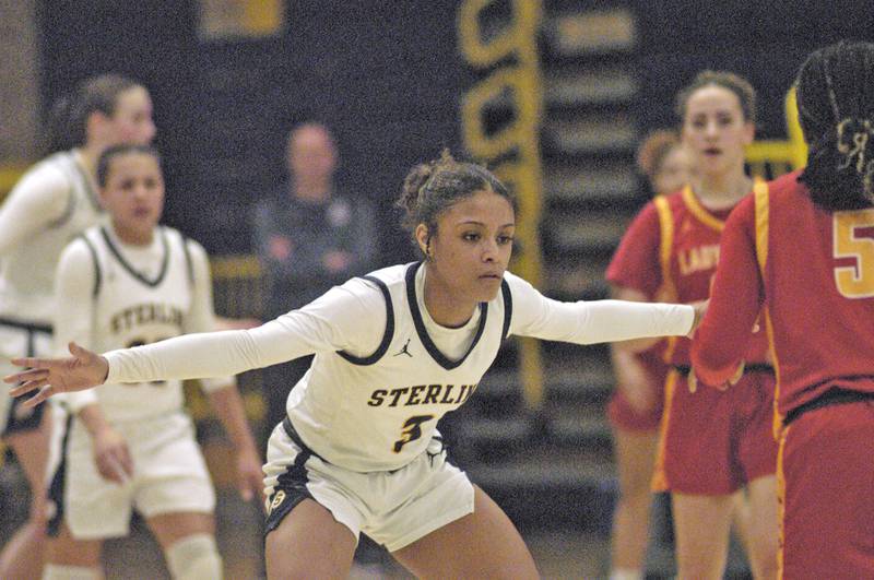 Sterling's Delali Amankwa plays defense agint a Rocl Island player. Western Big 6 conference champions Sterling hosted Rock Island in girls basketball. The action took place Thursday, February 13, 2025 at Musgrove Fieldhouse at SHS.