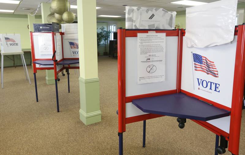 Empty voting booths are vacant on Tuesday, March 17, 2026 at Zion United Church of Christ in Peru.