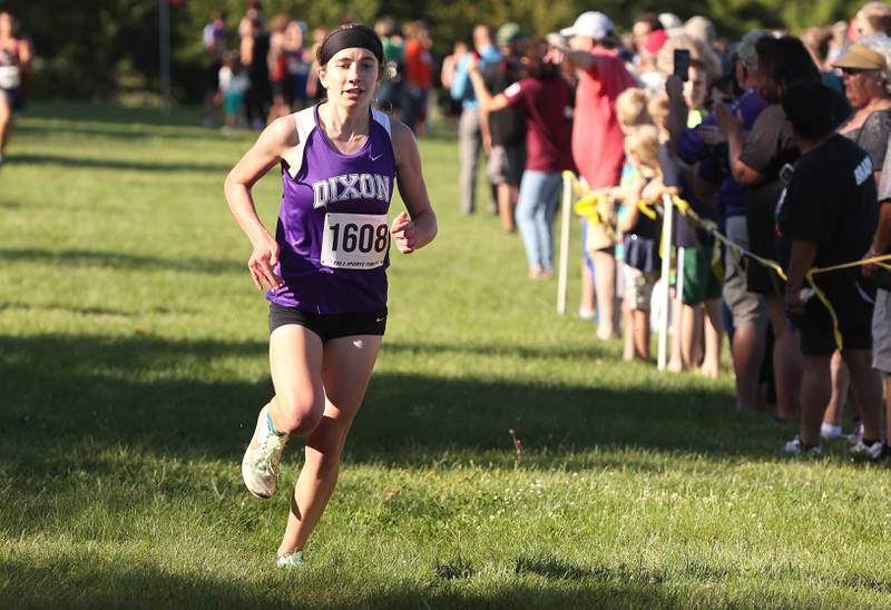 Dixon's Emily Conderman finishes second in the girls race Tuesday, Aug. 30, 2022, during the Sycamore Cross Country Invitational at Kishwaukee College in Malta.