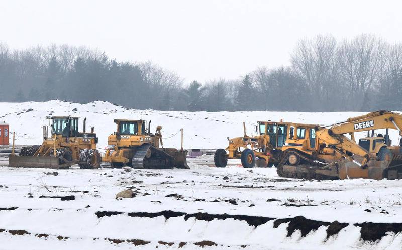 Construction crews continue work Friday at the ChicagoWest Business Center in DeKalb. Ferrara Candy Company has announced plans to build at the site.