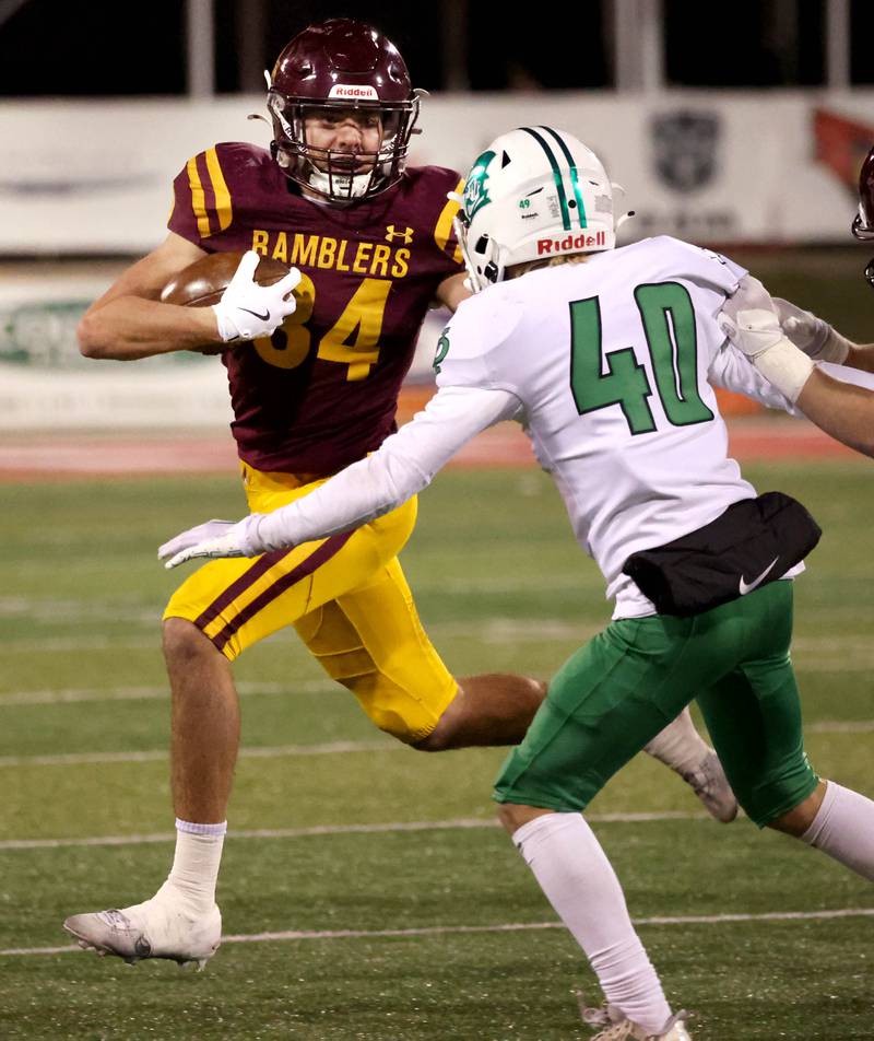 Loyola Academy's Drew MacPherson tries to get outside of York’s Noah Zmrhal during their Class 8A state championship game Saturday, Nov. 30, 2024, in Hancock Stadium at Illinois State University in Normal.