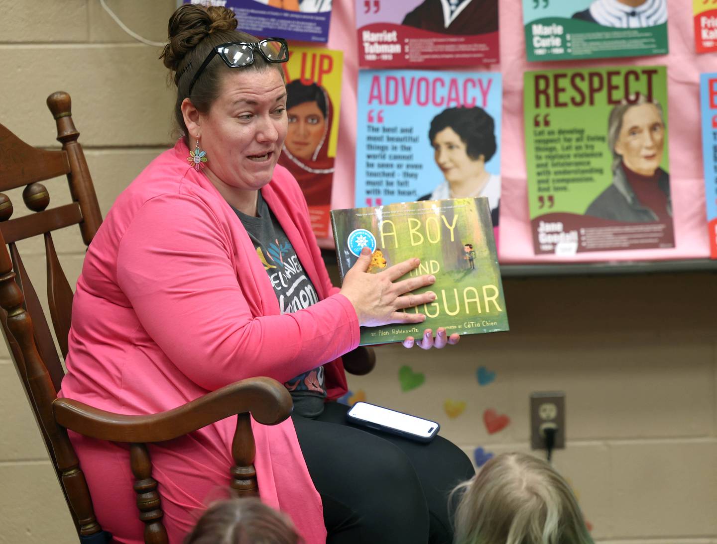 Cortland Elementary School librarian/media assistant Leslie Leahy gets ready to read a book to fourth graders Tuesday, March 31, 2026 in the library at the school.