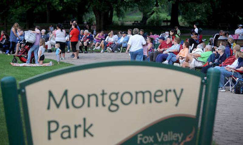 File photo: A large crowd gathered at Montgomery Park for ice cream and the music of Cool Rockin’ Daddies during a recent Fox Valley Park District Ice Cream Social and Concert in the Park.