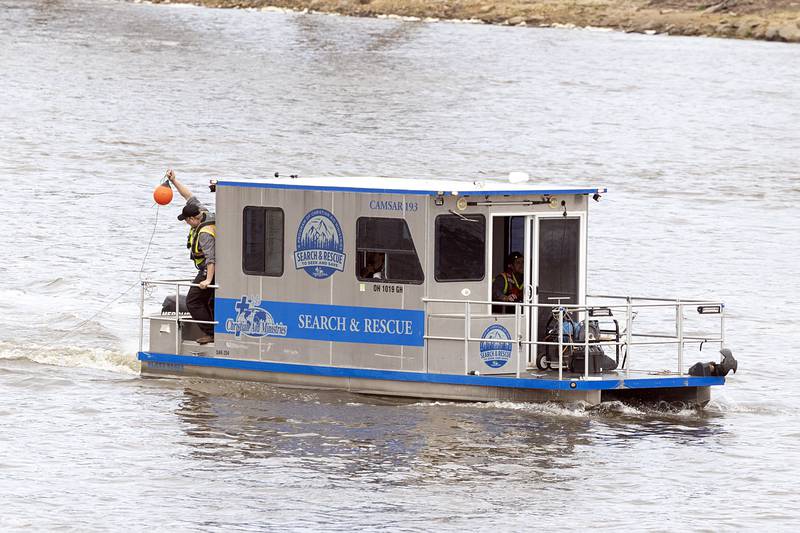 Search squads check the Rock River in Dixon Tuesday, April 14, 2026, after an individual jumped over the railing off of the Peoria Avenue Bridge late Monday night.