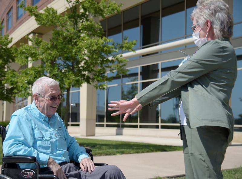 Jack Wilson of Burlington meets nurse Bo Kielbus for the first time since she saved his life after he went into cardiac arrest in July at the outpatient lab at Advocate Sherman Hospital in Elgin.