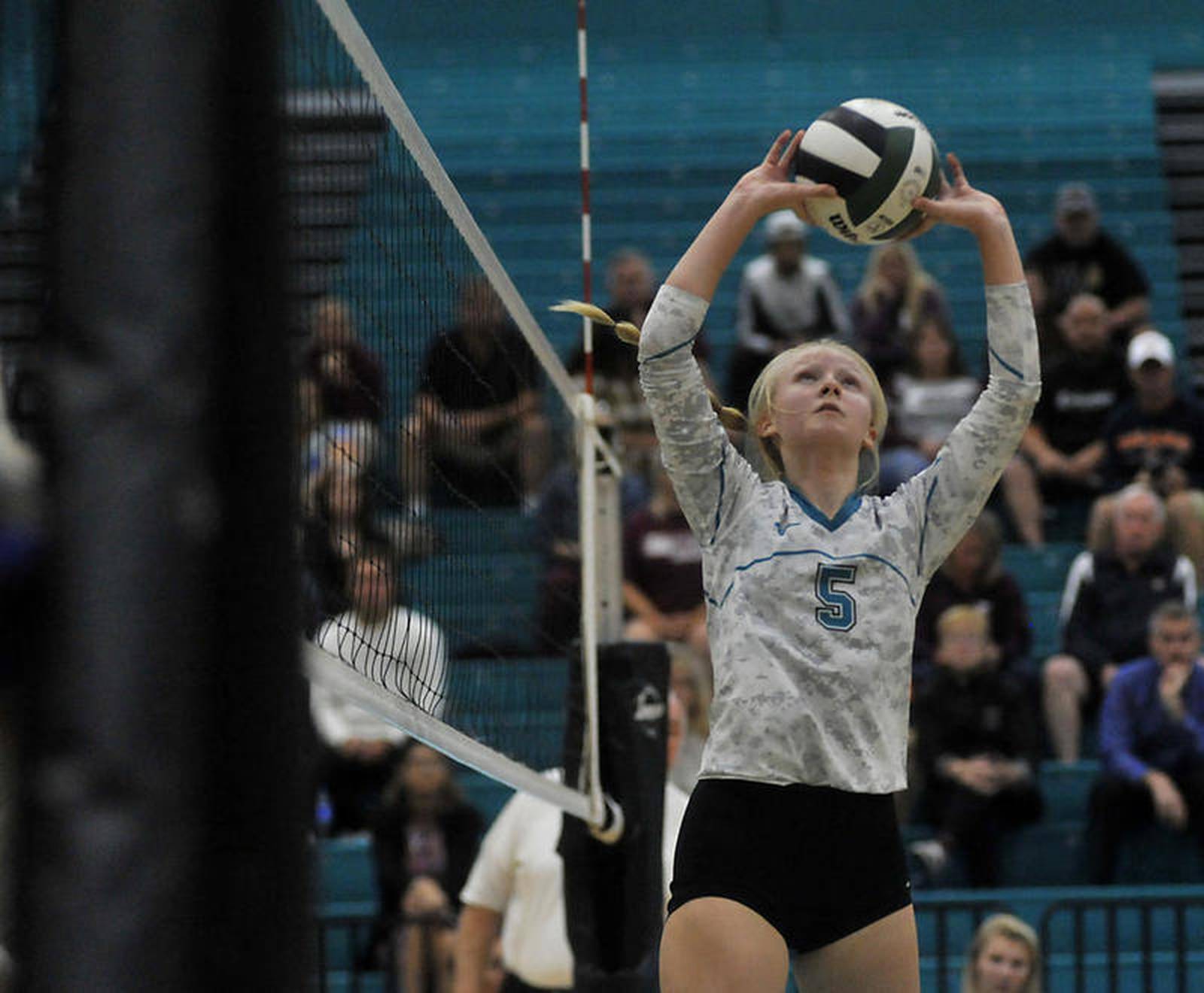 High school volleyball Redhot Marengo holds off Woodstock North for