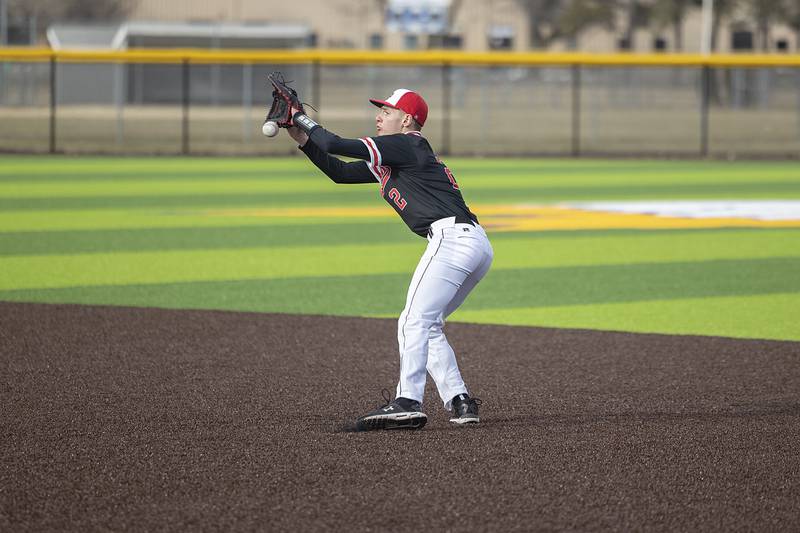 E-P’s second baseman Bryce Jepson misplays a ball but is able to recover and record the out at first base Wednesday, March 15, 2023 against Sterling.