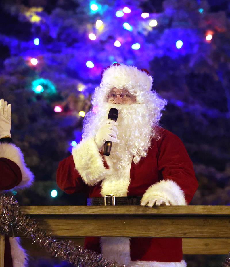 Santa and Mrs. Claus light the Christmas lights on the courthouse lawn Friday, Dec. 6, 2024, during the Sycamore Chamber of Commerce’s Walk With Santa in downtown Sycamore.