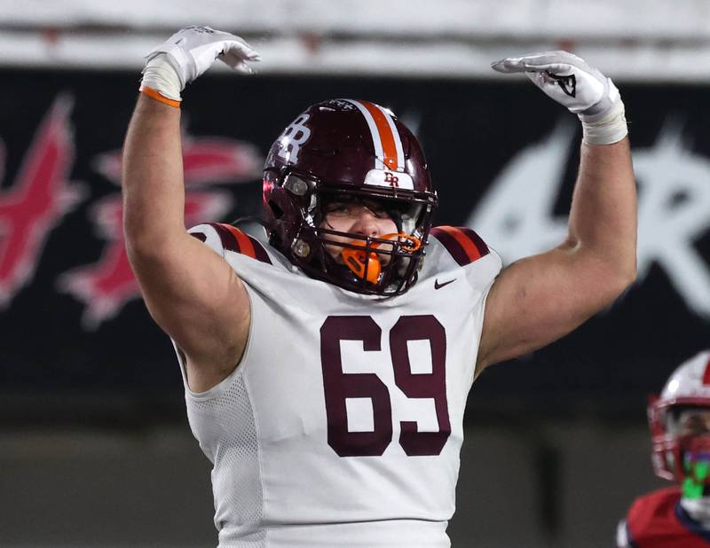 Brother Rice's AJ Parochelli celebrates as time expires Wednesday, Dec. 3, 2025, in their IHSA Class 7A state chamionship win over St. Rita in Huskie Stadium at Northern Illinois University in DeKalb.