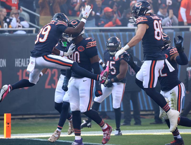 The Chicago Bears kickoff team celebrates a big play during their game Sunday, Nov. 23, 2025, against the Pittsburgh Steelers at Soldier Field in Chicago.