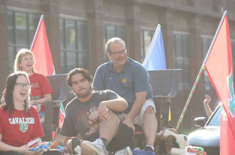 Peru mayor Ken Kolowski and family ride a float during the L-P homecoming parade on Thuesday, Oct. 2, 2025 downtown Peru.