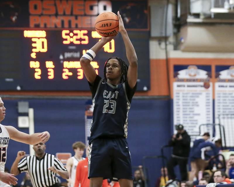 Oswego East's Mason Lockett (23) shoots a jump shot during their basketball game between Oswego East at Oswego Friday, Jan 09, 2025 in Oswego.
