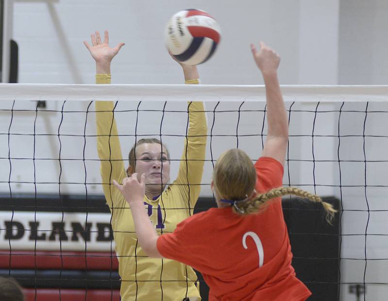 Serena’s Jenna Setchell (21) blocks Woodland’s Ella Derossett (2) during the opening set Tuesday, Sept. 5, 2023, at the Warrior Dome.