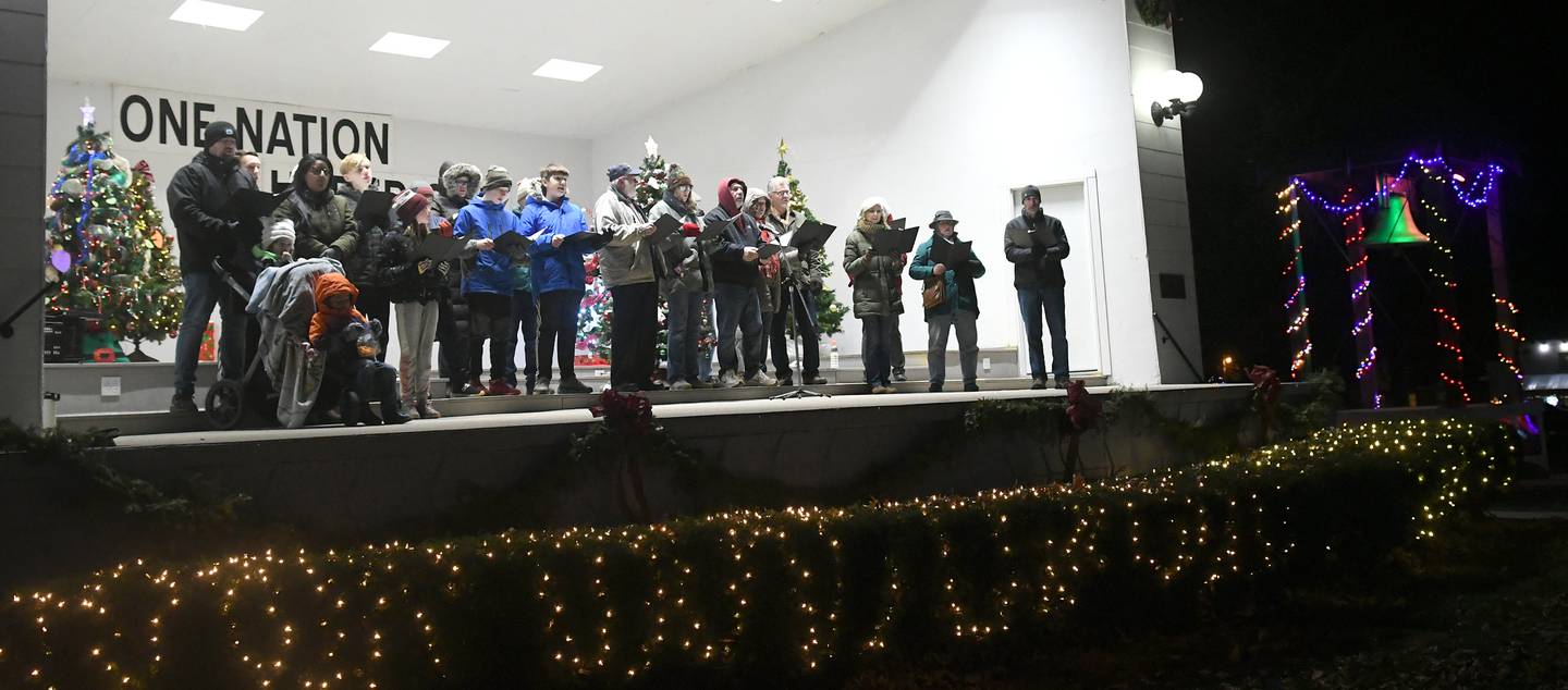 Mt. Morris' Festival of Lights included carolers who sang Christmas songs on the stage of the band shell after the Campus Square was lit up on Dec. 3.