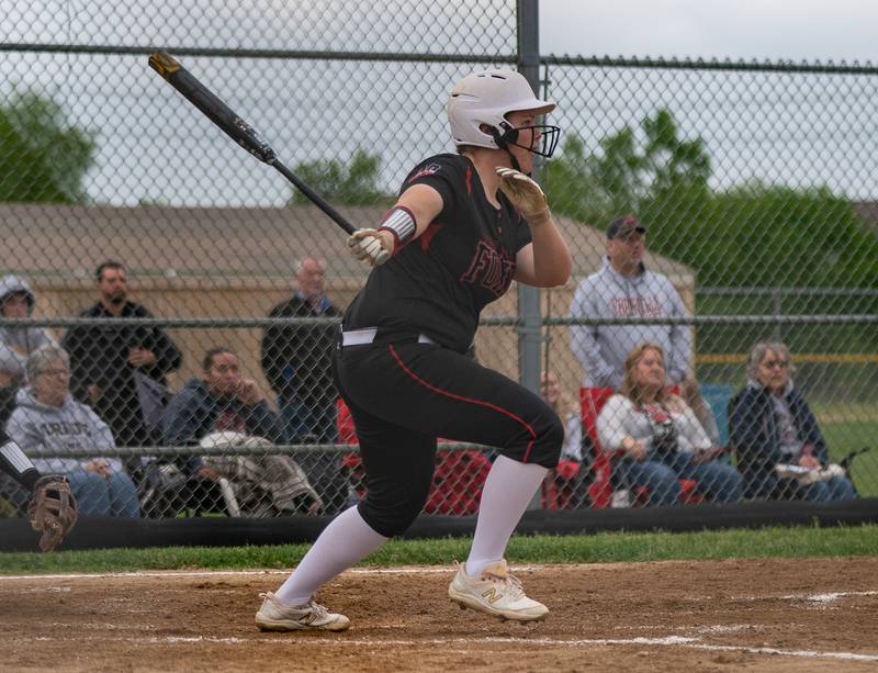 Yorkville's Jensen Krantz (20) slaps a two run single against Plainfield North during the Class 4A Oswego East Regional softball final at Oswego East High School on Friday, May 27, 2022.