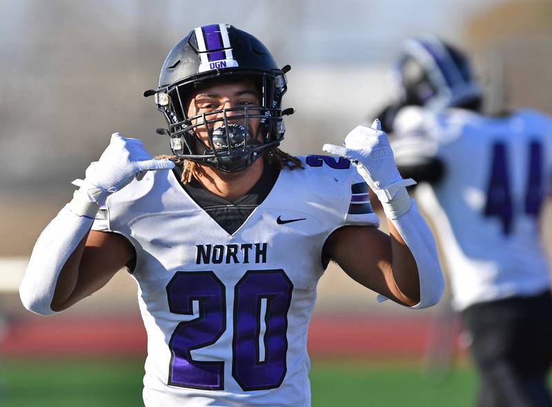 Downers Grove North's Noah Battle celebrates after scoring a touchdown against Lincoln-Way West during an IHSA Class 7A quarterfinal game on Nov. 11, 2023 at Lincoln-Way West High School in New Lenox.