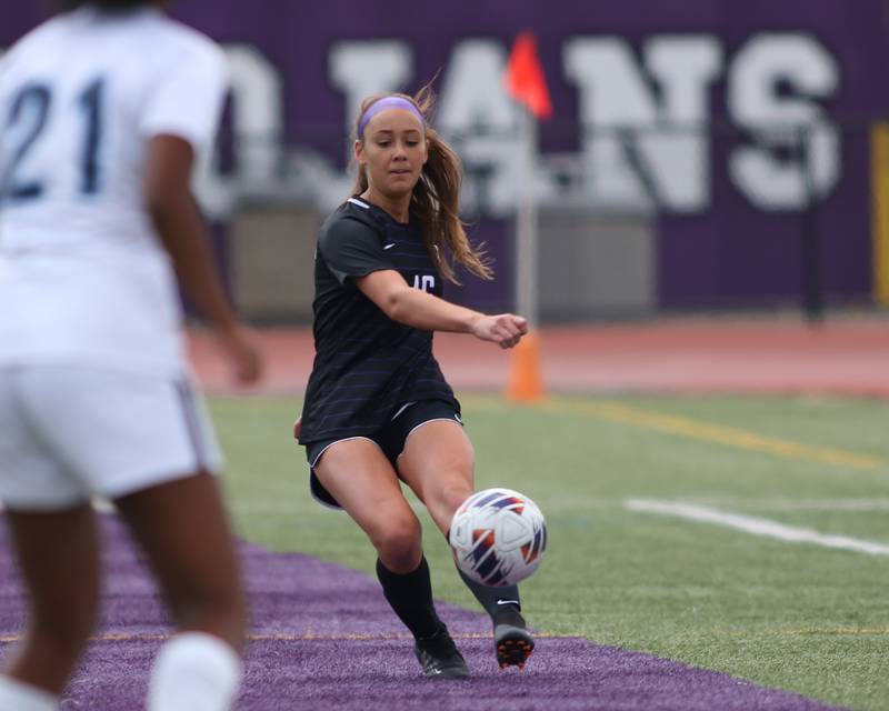 Downers Grove North's Caroline Siebert (16) keeps the ball in bounds during soccer match between Downers Grove North at Downers Grove South.  May 6, 2023.