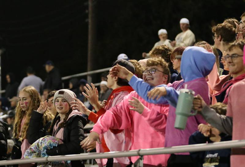 Marquette fans cheer on the Crusaders as they play St. Bede on Friday, Oct. 13, 2023 at Gould Stadium.