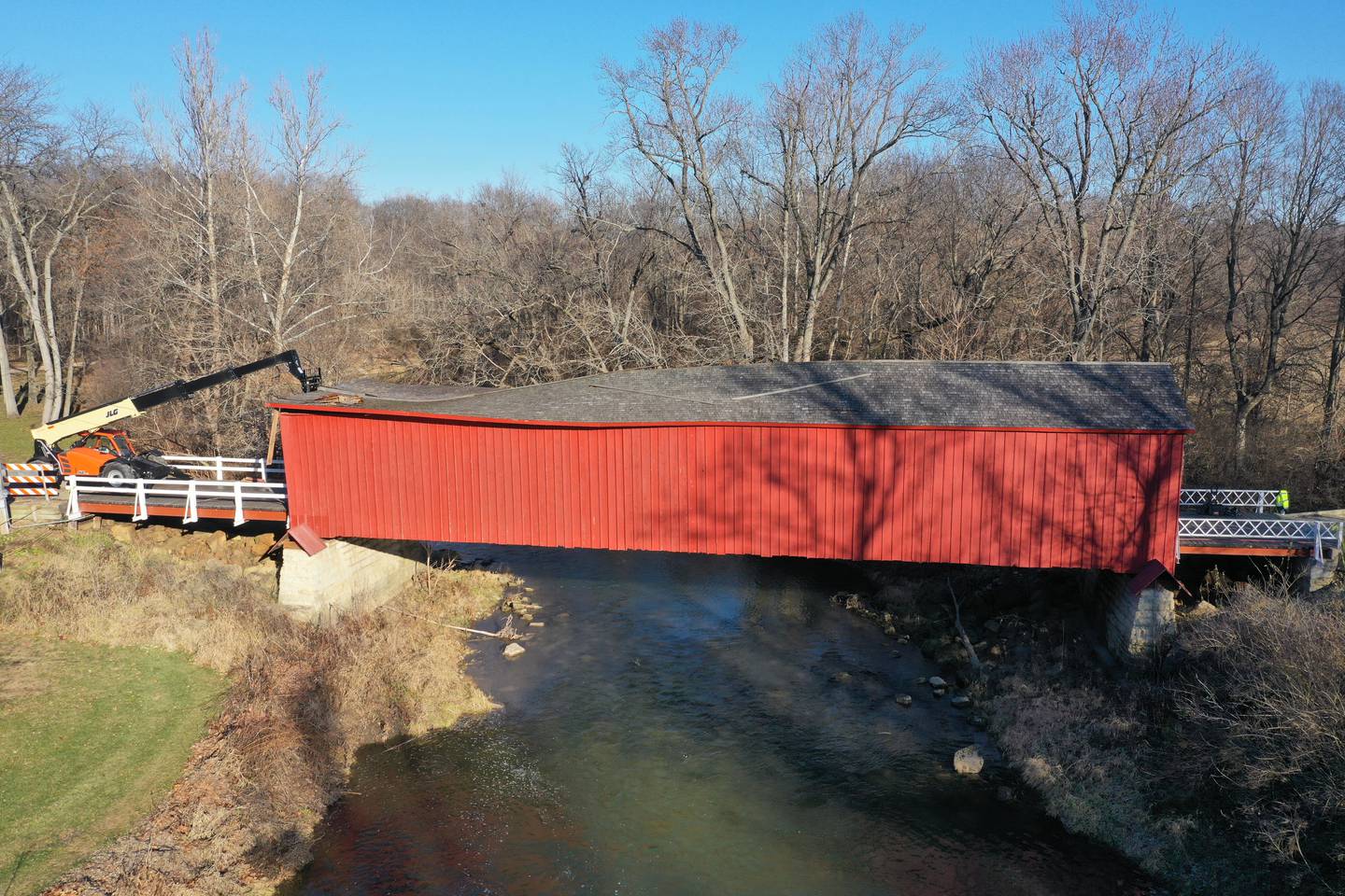 A view looking east at the Red Covered Bridge on Monday, Dec. 11, 2023 in Princeton. An Illinois Department of Transportation crew started repairs on the historic structure. The bridge was severely damaged when it was struck by a semi truck on Nov. 16.
