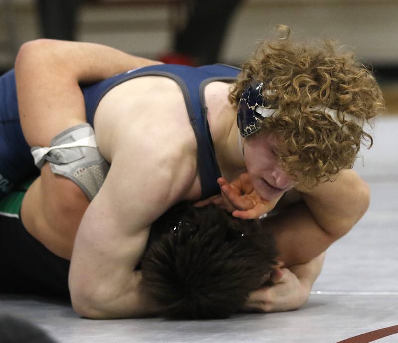 Cary-Grove’s Noah Pechotta tries to pin Grayslake Central’s William Lyle in a 165-pound semifinal match of the IHSA 2A Antioch Wrestling Regional on Saturday, Feb. 8, 2025, at Antioch High School.