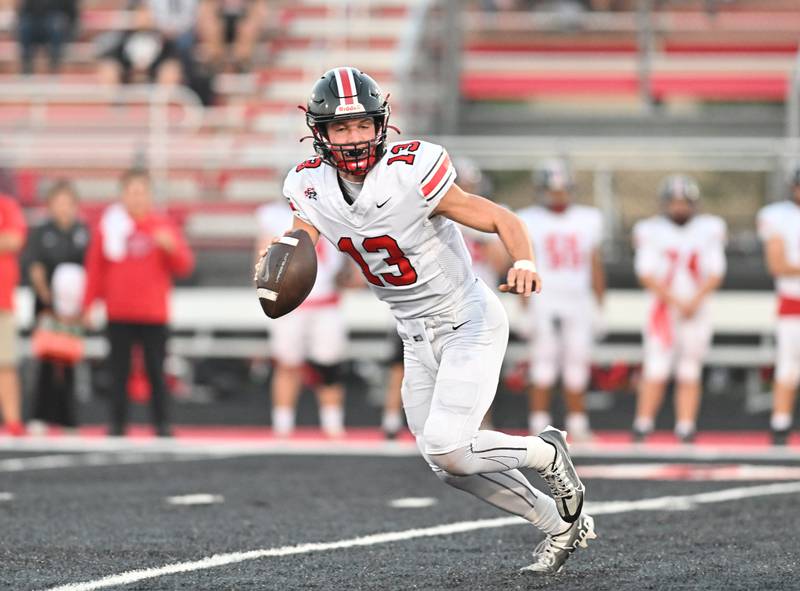 Lincoln-Way Central's Michael Kuehl looks to pass the ball during a non-conference game against Bolingbrook on Friday, Sep. 29, 2023, at Bolingbrook. (Dean Reid for Shaw Local News Network)