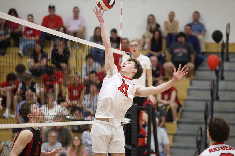 Bolingbrook’s Connor Dmochowski flips a shot over the net against Lincoln-Way Central on Tuesday May 7, 2024 in New Lenox.